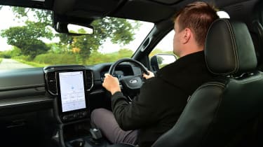 Auto Express senior news reporter Alastair Crooks driving the Ford Ranger Platinum